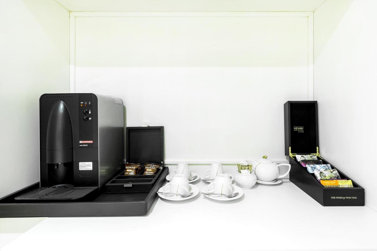 Rixos Khadisha Shymkent Hotel Екстериор снимка A coffee machine
